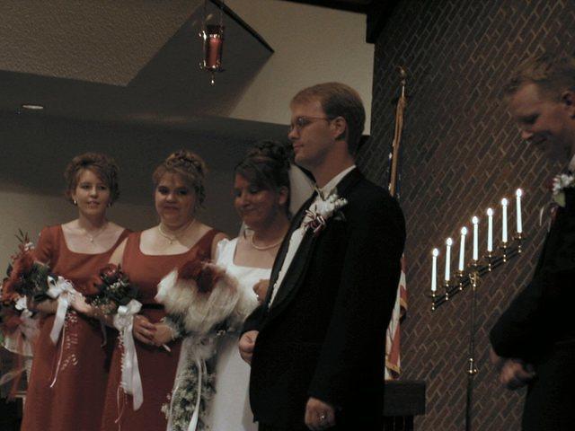 ..and turn as they are announced husband and wife. 10/4/03