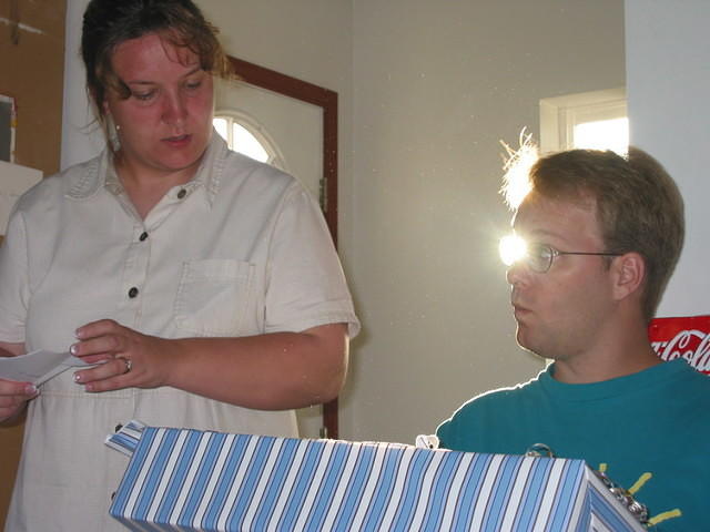 Michelle and Shawn opening presents.
