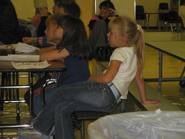 Carrie and Tiffany watching a movie at the end of chemistry class.