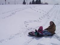 Carrie and Michelle sledding - 3/23/02