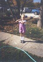 Carrie with her baseball bat - 10/6/03