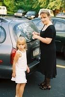 Carrie and Michelle decorating Gram and Pap's car