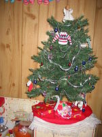 The little Christmas tree in Carrie's room.  Seems Santa left stuff here too!
