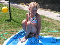 Carrie sitting at the top of the slide.