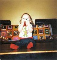Paige at 9 months old, eating matchbox cars.
Approximately April 1981