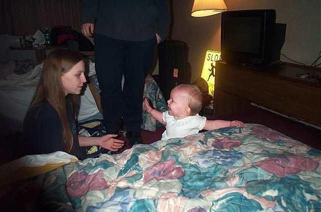Paige and Carrie, with Carrie trying to walk.