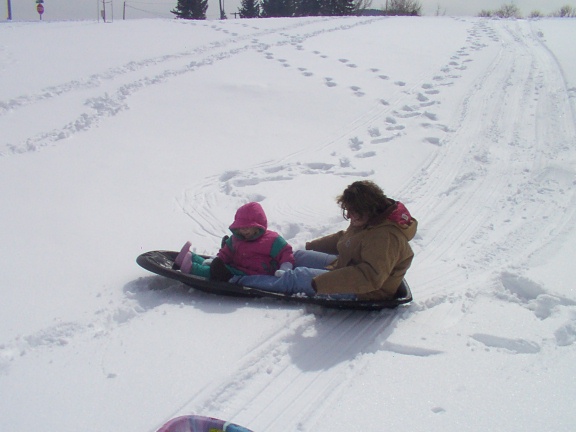 Carrie and Michelle sledding - 3/23/02