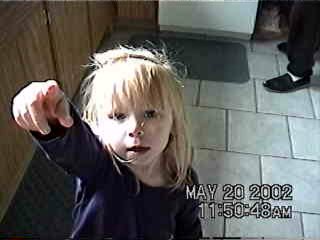 Carrie points.. at the camera? - 5/20/02