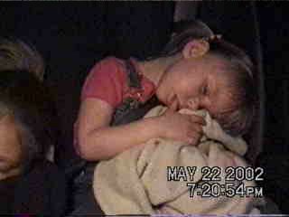 Carrie - asleep in the car - 5/22/02