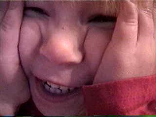 So of course, Carrie squishes her face too - 5/21/02