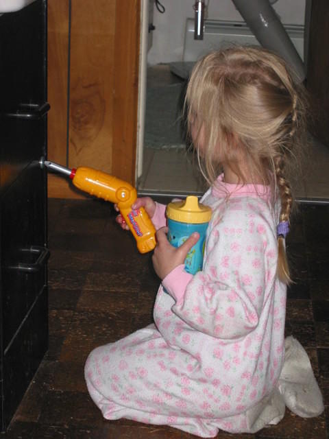 Carrie showing me how she uses her drill!