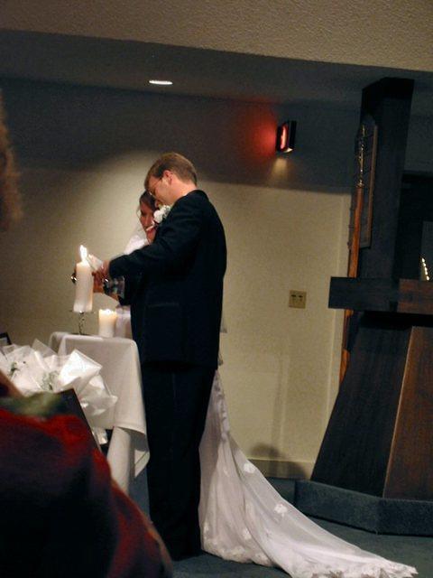 Michelle and Shawn and the unity candle. 10/4/03
