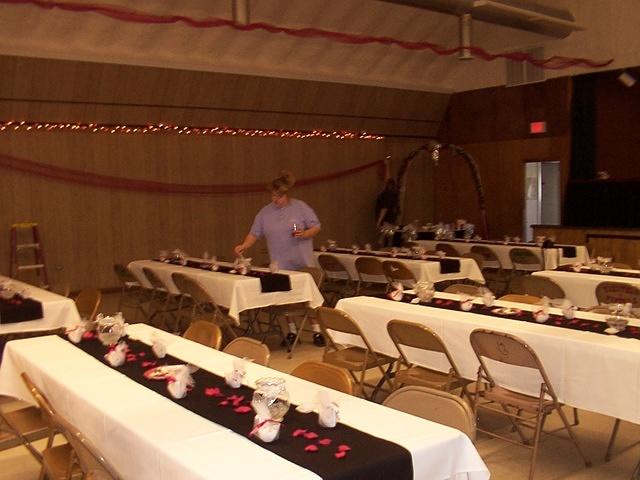 Shannon, adding decorations to the tables. 10/3/03