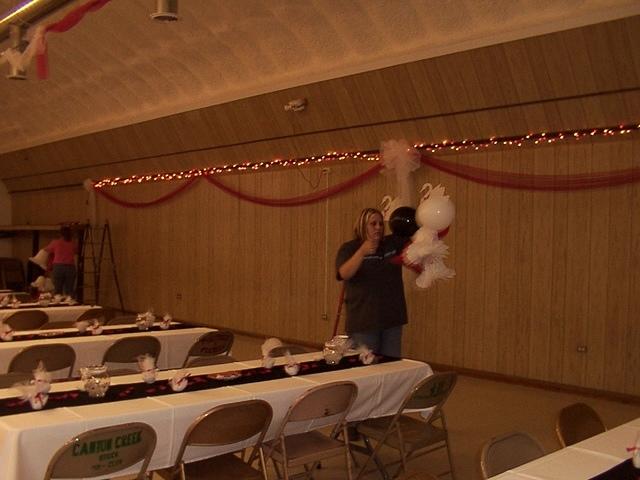 The other Michelle, hanging decorations.  10/3/03