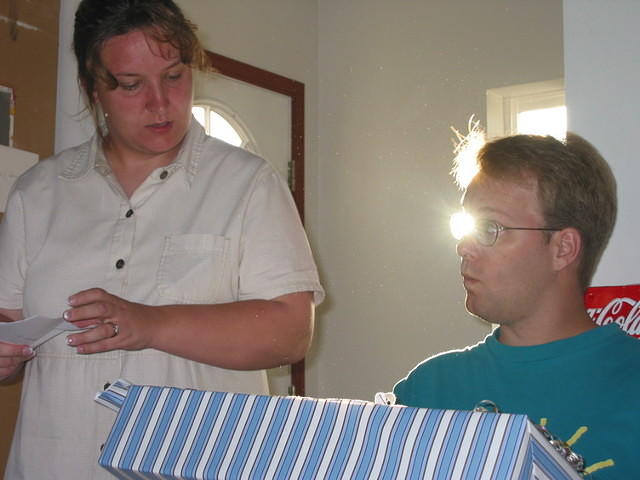 Michelle and Shawn opening presents.
