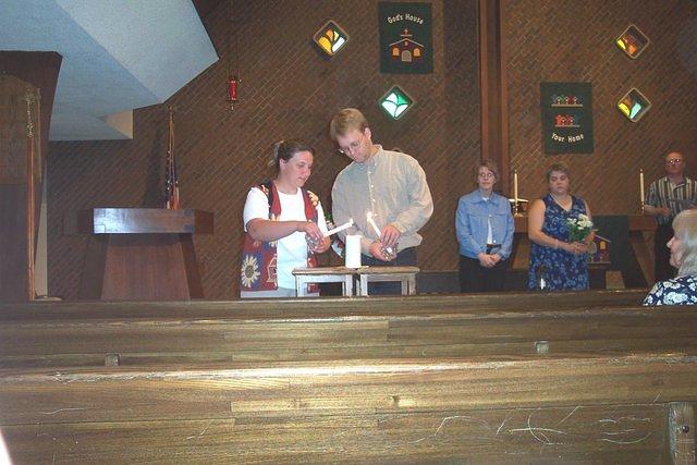 Michelle and Shawn, practicing lighting the unity candle. 10/3/03