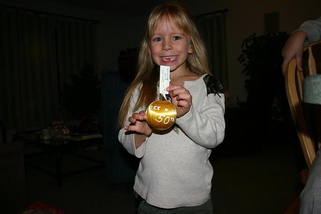 Carrie helps decorate Uncle Shawn and Aunt Michelle's Christmas tree, and shows Dad there really were Christmas ornaments from G