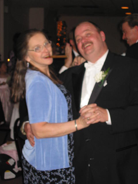 Mom and Uncle Eric dancing, and yes, that's also a cigar.