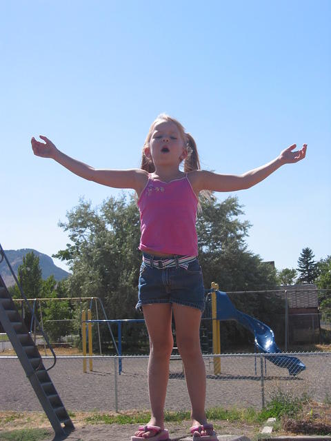 Carrie standing ontop of these wooden blocks yelling "I'M QUEEN OF THE WORLD".  She obviously watches WAY too much tv.