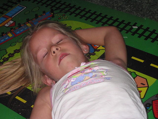 Carrie pretending to be dead.