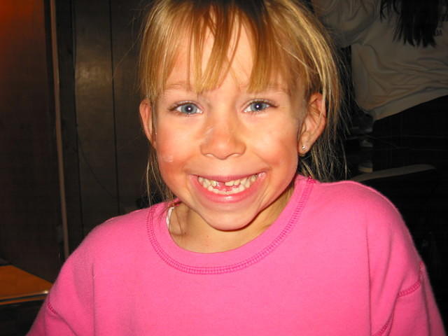 Carrie's newest smile.. missing a tooth! (3rd one she's lost)
