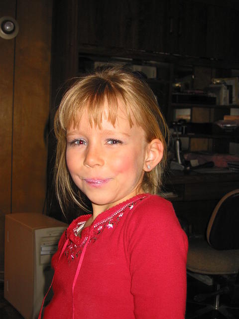 Far too much make-up.  It's almost scary. ;)