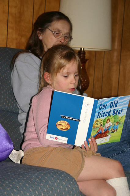 Carrie reading to Mom
