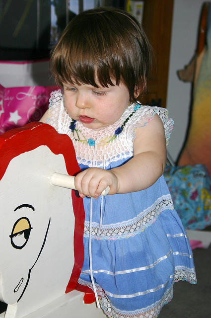 Joleigh on her rocking horse.
