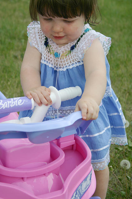 Joleigh inspecting her 4wheeler