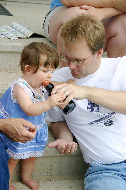 Joleigh drinking Daddy (Shawn's) root beer.