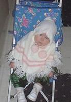 Carrie in her stroller.