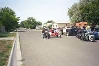 Sam on trike, Ghost in front, Kaslo standing, unknown other