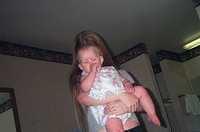 Paige hiding behind Carrie