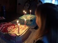 Singing "happy birthday" and Carrie is ready to blow out the candles
