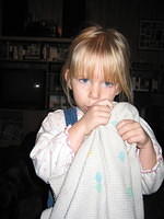 Carrie's not SUPPOSED to be sucking her thumb anymore - 12/9/02
