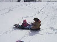 Carrie and Michelle sledding - 3/23/02