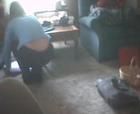 Paige - gathering up some paper - 9/30/02