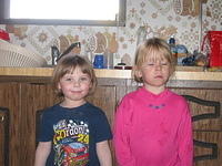 Kaytlin and Carrie, as you can see, I could NOT get them to both look at me with their eyes open.. 4/7/03