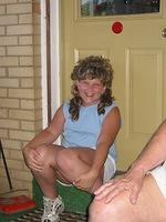 Amber decided to try the wig on, and it almost looks like her hair - 8/5/03