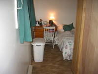 Carrie's room is like a hallway--it actually used to be a sidewalk on the outside of the house.  Pretty weird.