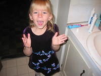 Carrie went to the bathroom to check her hair. haha.