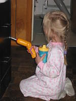 Carrie showing me how she uses her drill!