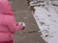 Carrie holding snow