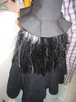 the back of witch Carrie.