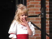 Carrie again, I think she's trying to hide the potato chips in her mouth with her hand.. 10/4/03