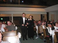 Shawn escorting Mom down the aisle. 10/4/03