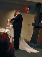 ..and each take the candle lit by their parents, and together light a third candle.. the unity candle. 10/4/03