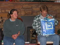 I'm amazed Shawn was trying to UNTIE the ribbon, instead of just cutting it. 9/12/03