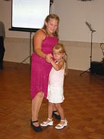 Carrie and Amber dancing.