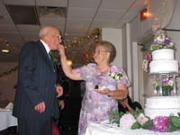 Gram feeding Pap cake.
